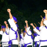 力強く天に突き上げるこぶし-野原マストリャー