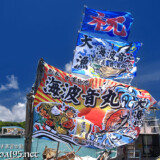 青空にはためく大漁旗-池間島海神祭